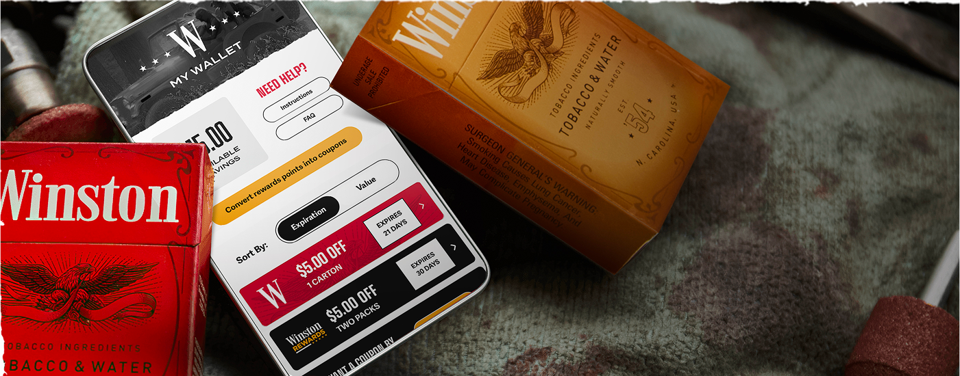 Two packs of quality Winston cigarettes with a phone and a premium mobile Winston cigarette coupons.